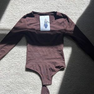 Never worn tiktok viral slimming bodysuit.